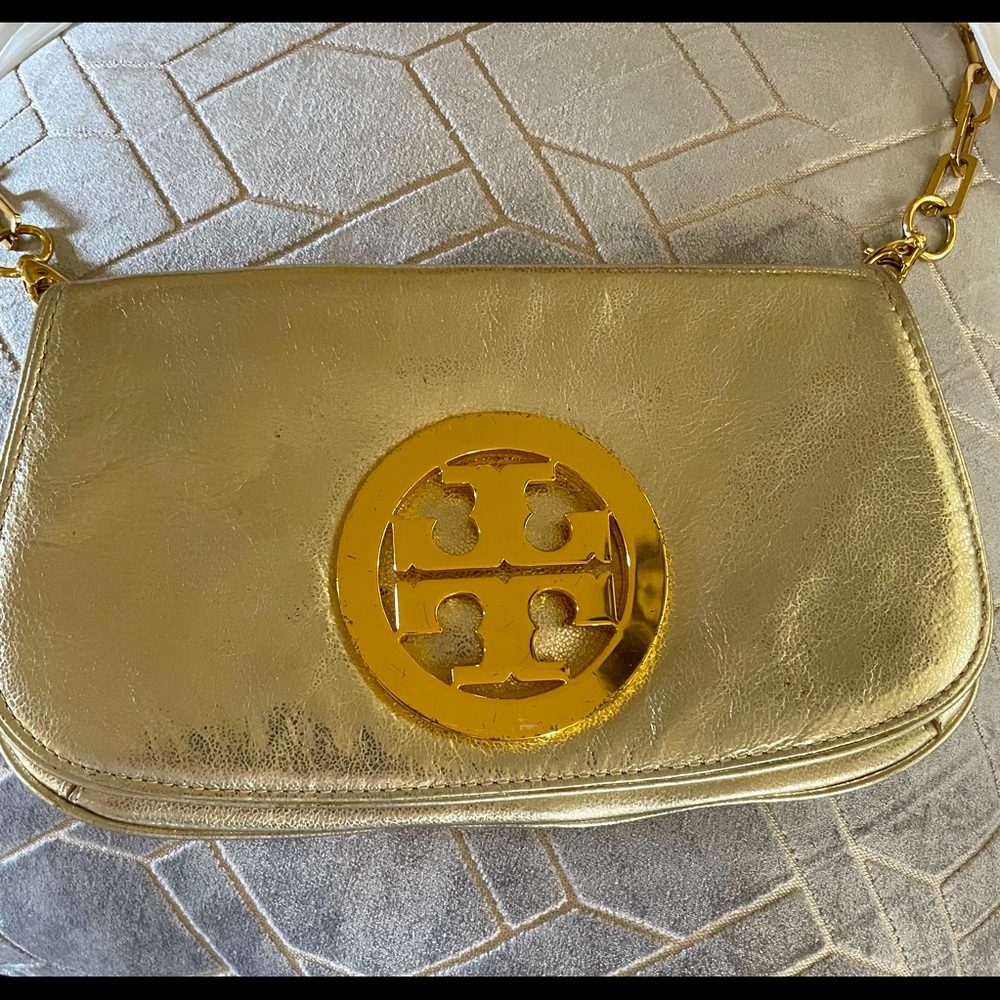 Tory Burch Reva Gold Clutch with detachable  chain and personal touch up mirror.